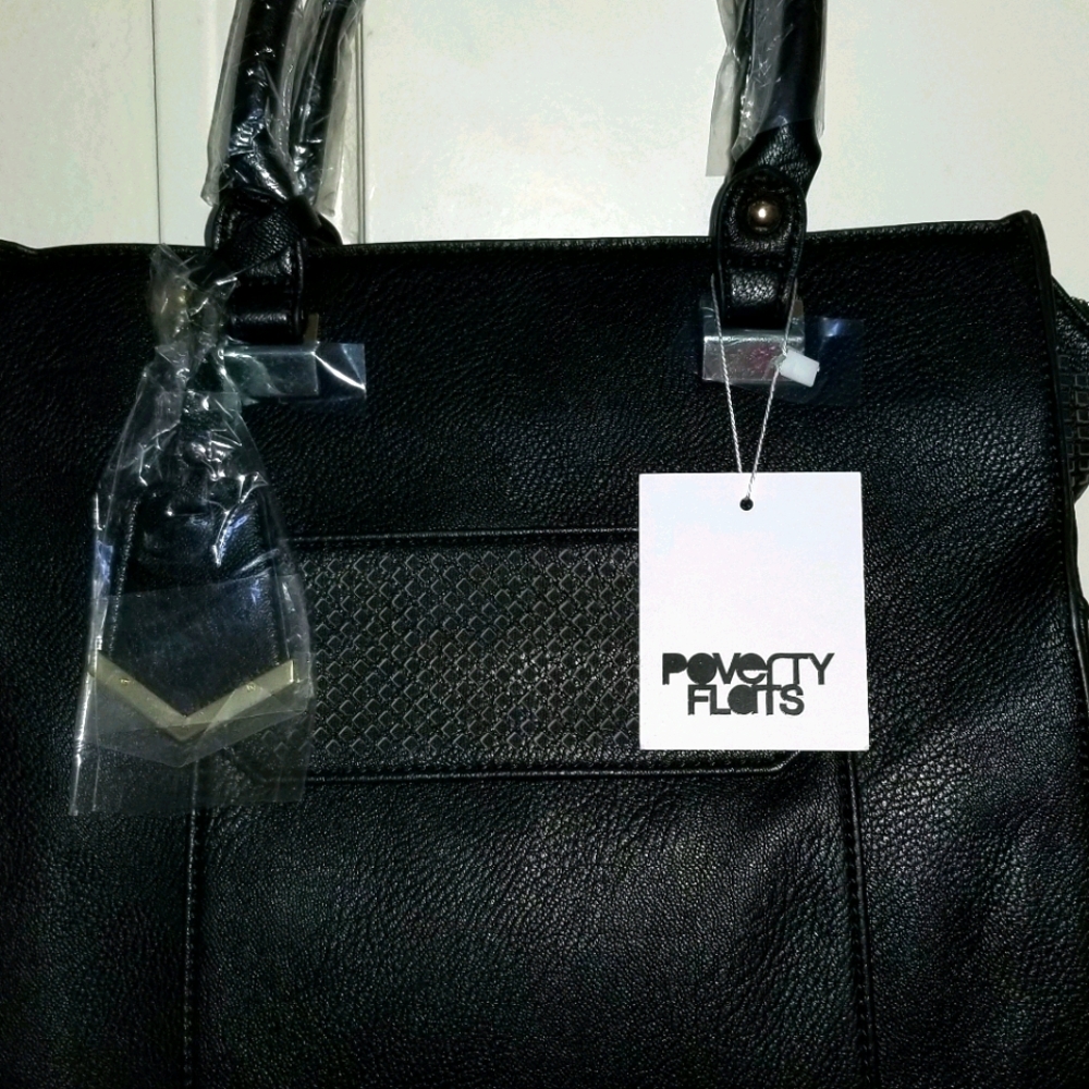 Black satchel with mesh and gold accents